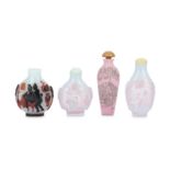 FOUR CHINESE GLASS 'EROTIC' SNUFF BOTTLES.