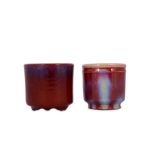 TWO CHINESE FLAMBE-GLAZED CYLINDRICAL INCENSE BURNERS.