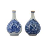 TWO CHINESE BLUE AND WHITE BOTTLE VASES.