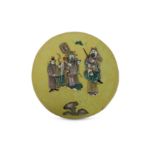 A CHINESE FAMILLE VERTE CIRCULAR YELLOW-GROUND PANEL.