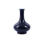 A Chinese monochrome blue glazed vase