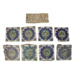 A group of eight Iznik-style pottery tiles and a copper lustre-painted wall tile