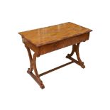 An early 19th Century Biedermeier satin birch writing table