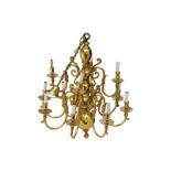 A contemporary 17th century Dutch style brass twelve light chandelier