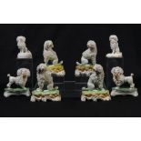 Four pairs of early 20th century Dresden models of poodles