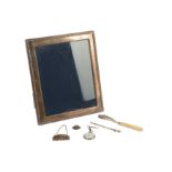 A silver easel photograph frame