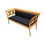 An early 20th Century Biedermeier satin birch and ebonised sofa