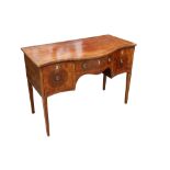 A Regency mahogany serpentine fronted sideboard