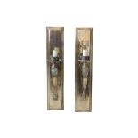 A pair of brass wall sconces,