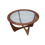 A circular G-Plan teak Astro coffee table