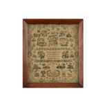 An early Victorian sampler worked in coloured silks