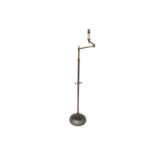 A Besselink & Jones adjustable telescopic brass floor standing reading light