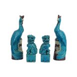 A pair of 20th century Chinese turquoise glazed temple or Fo dogs