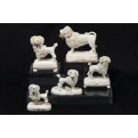 A collection of Staffordshire porcelain poodles, circa 1835-50