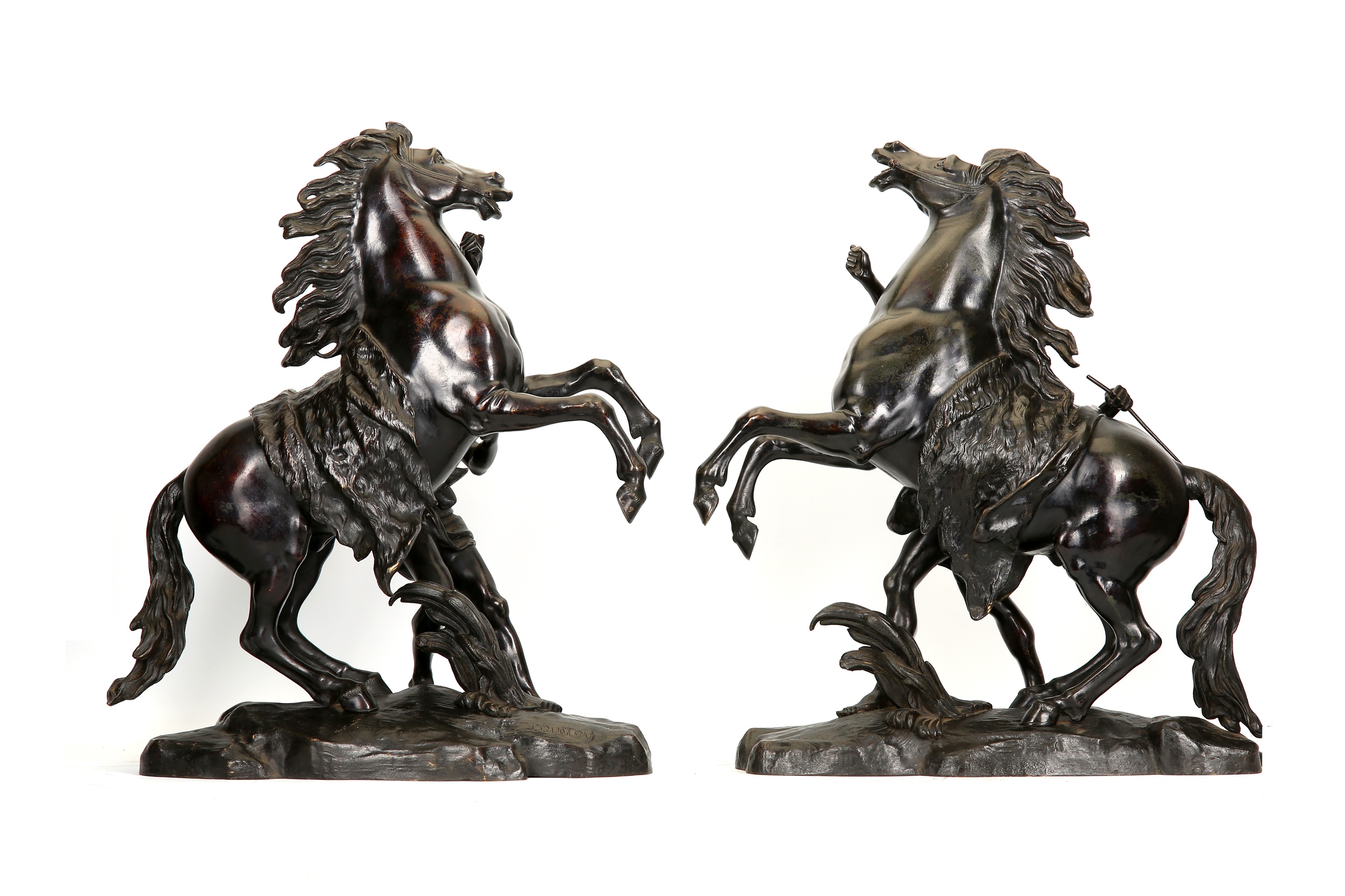 A LARGE PAIR OF MID 19TH CENTURY FRENCH BRONZE MODELS OF THE MARLY HORSES AFTER THE MODELS BY