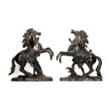 A LARGE PAIR OF MID 19TH CENTURY FRENCH BRONZE MODELS OF THE MARLY HORSES AFTER THE MODELS BY