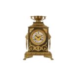 A LATE 19TH CENTURY FRENCH GILT BRONZE MANTEL CLOCK BY LAVASSORT OF PARIS