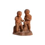 A 19TH CENTURY FRENCH TERRACOTTA FIGURE OF TWO INFANTS IN THE MANNER OF JEAN - BAPTISTE PIGALLE