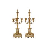 A PAIR OF LATE 19TH CENTURY FRENCH GILT BRONZE AND ALGERIAN ONYX MANTEL CANDELABRA IN THE MANNER OF