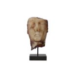 A SOUTH ARABIAN ALABASTER HEAD, CIRCA 1ST CENTURY B.C. - 1ST CENTURY A.D.