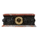 AN EARLY 20TH CENTURY FRENCH PATINATED BRONZE AND RED MARBLE PLINTH CLOCK
