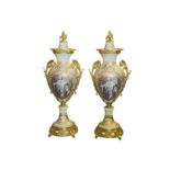 A LARGE PAIR OF LOUIS XVI STYLE PORCELAIN AND GILT METAL VASES