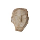 A SOUTH ARABIAN ALABASTER HEAD OF A MAN, CIRCA 1ST CENTURY B.C.- 1ST CENTURY A.D.