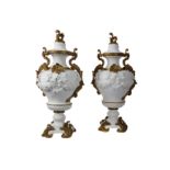 A PAIR OF VERY LARGE 19TH CENTURY GILT BRONZE MOUNTED SÈVRES BISCUIT PORCELAIN VASE AND COVERS