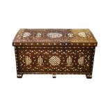 λ A LARGE HARDWOOD MOTHER-OF-PEARL AND TORTOISE SHELL-INLAID OTTOMAN CHEST