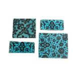 FOUR TURQUOISE AND BLACK-PAINTED 'DOME OF THE ROCK' POTTERY TILES