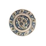 AN IZNIK-STYLE DAMASCUS POTTERY DISH