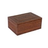 A CARVED FRUITWOOD CASKET