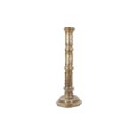 A MONUMENTAL BRASS OPENWORK CANDLESTICK