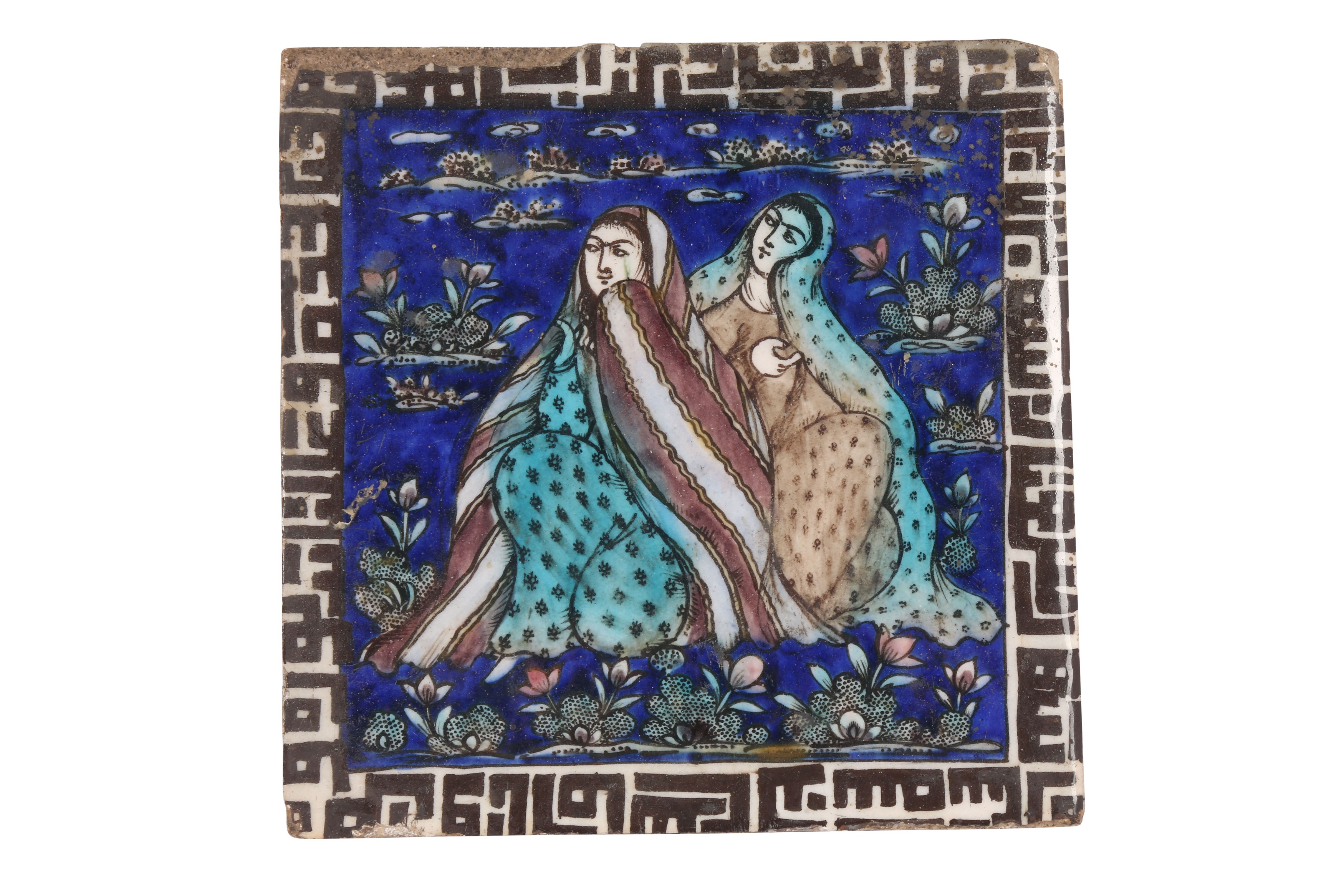 A QAJAR POLYCHROME-PAINTED POTTERY TILE