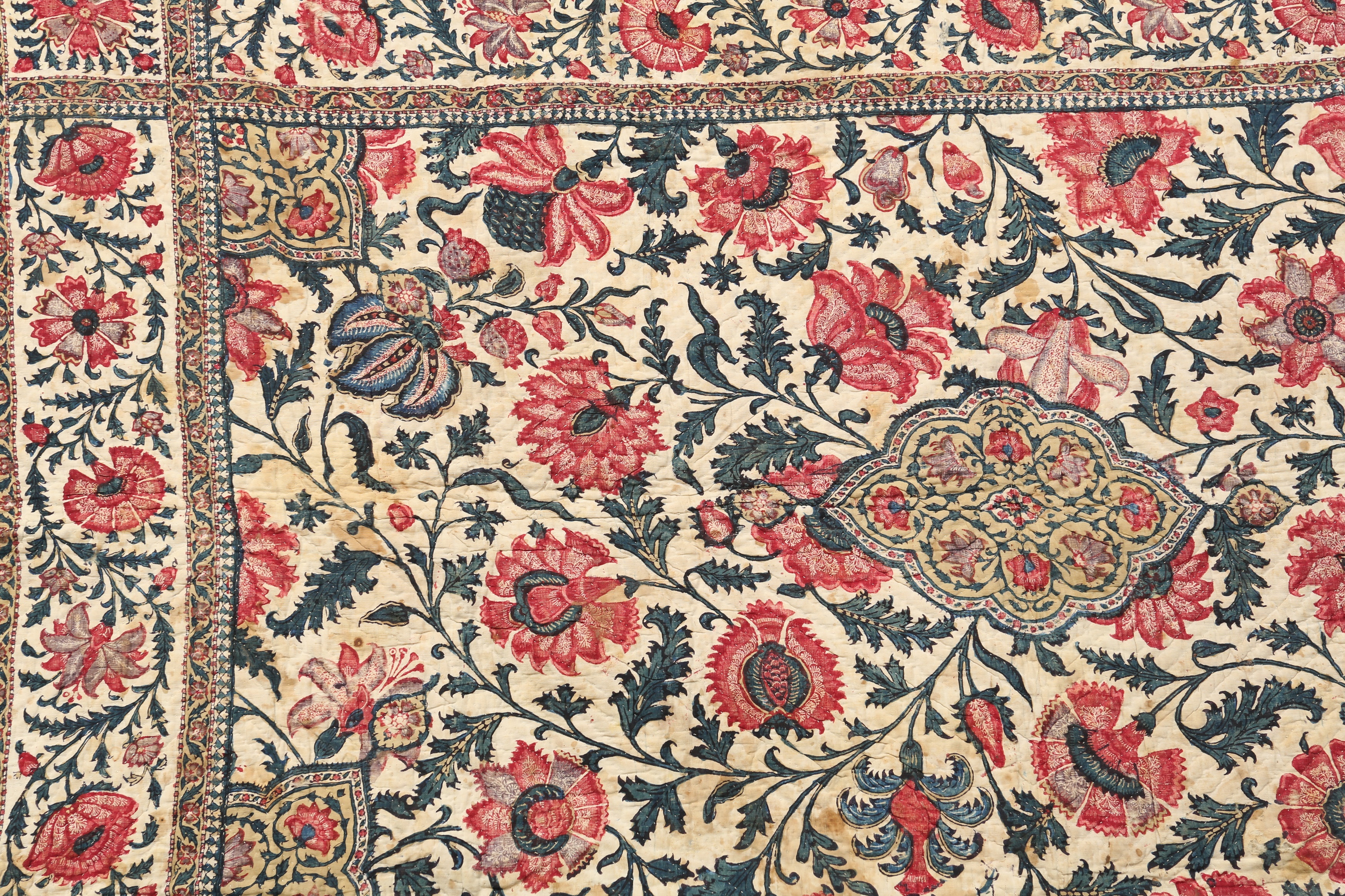 AN INDO-PERSIAN KALAMKARI CHILD’S QUILTED COT COVER - Image 2 of 3