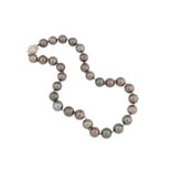 A cultured pearl necklace with a diamond clasp