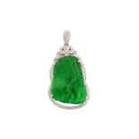 A jade and diamond pendant