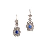 A pair of sapphire and diamond pendent earrings