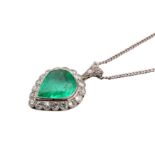 An emerald and diamond pendant necklace