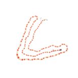 λ A pearl and coral necklace, with a pink sapphire and diamond clasp