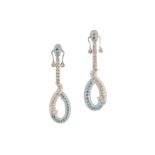 A pair of blue topaz and diamond pendent earrings