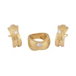 A 'Kit and Kaboodle' diamond-set ring and earclips, by Boodles