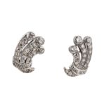 A pair of diamond earrings, circa 1935