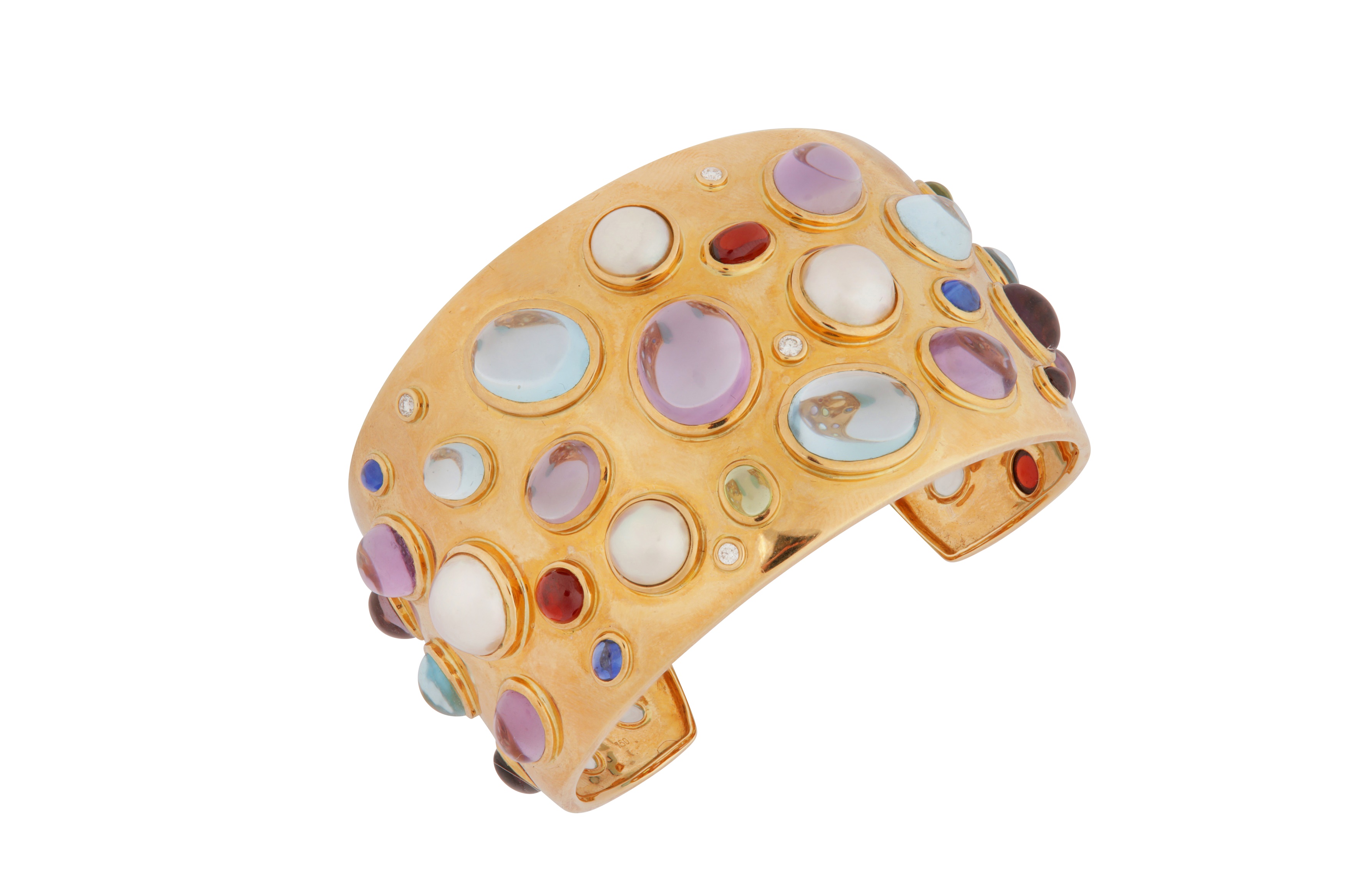 A gold and gem-set cuff, by Kiki McDonough