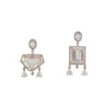 A pair of diamond and white topaz earrings