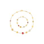 A gold and gem-set necklace, bracelet and earring suite, by Marco Bicego