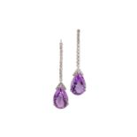 A pair of amethyst and diamond pendent earrings