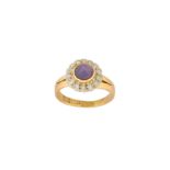 A purple star sapphire and diamond cluster ring, 1964