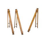 A SET OF THREE VINTAGE TRIPOD LEGS