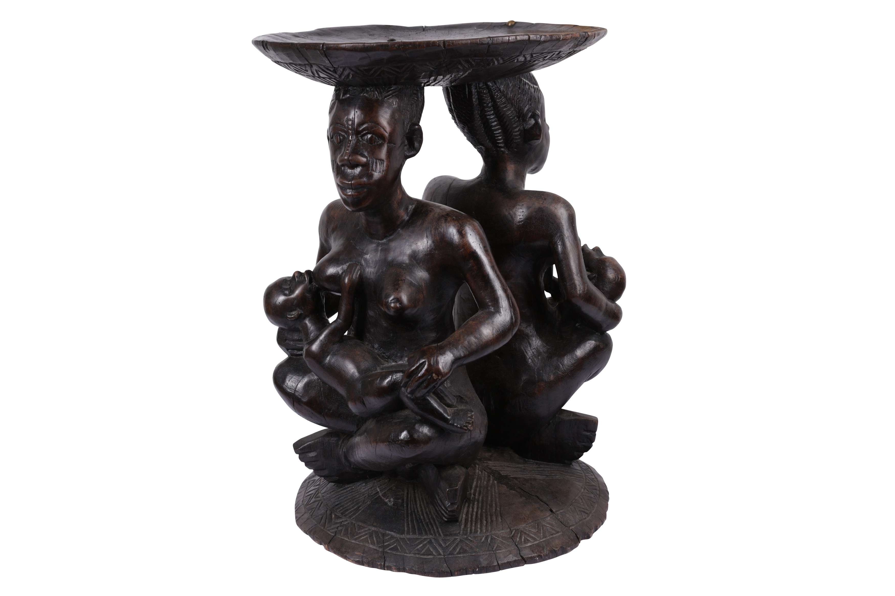 A WEST AFRICAN TRIBAL CARVED HARDWOOD MATERNITY FIGURE STOOL / TABLE